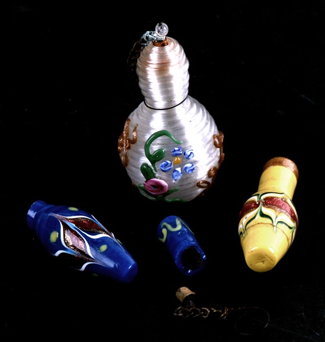 Three late 19th / early 20th century Venetian glass scent bottles, the largest 5cms (2ins) high. (