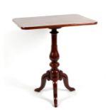 A Victorian mahogany occasional table, the rectangular top on turned column and tripod base,