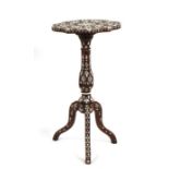 A Syrian mother of pearl inlaid occasional table on octagonal column and tripod base, 59cms (