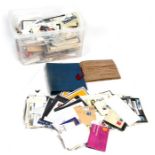 STAMPS: A massive quantity of loose stamps and first day covers contained in a plastic storage box