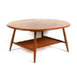 An Ercol '454' blond elm coffee table with spindle rack designed by Lucian Ercolani for Ercol, 99cms