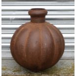An iron melon form vase, 44cms (17.25ins) high.