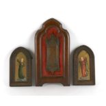 A pair of Florentine angelic prints in carved oak frames, each 22cms (8.5ins) high; together with