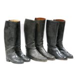 Three pairs of gentleman's leather riding boots.