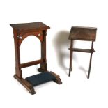 Two oak prayer stands, one with a kneeling cushion.