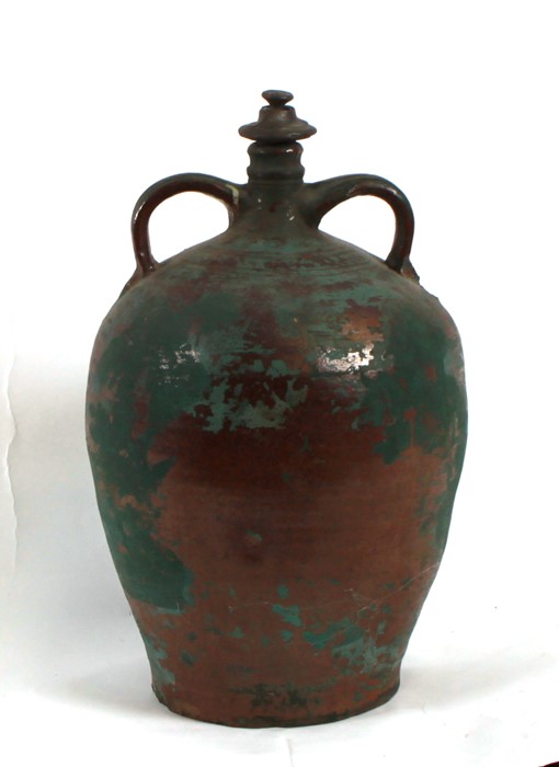 A large pottery two-handled jar, 43cms (17ins) high.Condition Report Stopper associated, a small