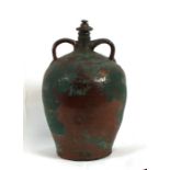A large pottery two-handled jar, 43cms (17ins) high.Condition Report Stopper associated, a small