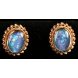 A pair of 9ct gold opal stud earrings.