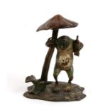 A Vienna cold painted bronze figure of a toad standing under a toadstool, 10cms (4ins) high.