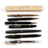 A group of propelling pencils and fountain pens to include Sheaffer and Parker.