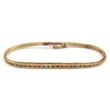 A 9ct three colour gold bracelet.