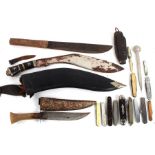 A WWII military penknife; together with a horn handled dagger; a kukri; and a quantity of