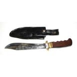 A large folding Bowie knife in its leather scabbard. Blade length 28cms (11ins) Condition Report