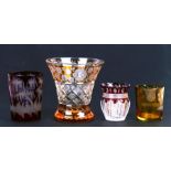 A Bohemian flashed glass vase, 11cms (4.25ins) high; together with three similar beakers (4).