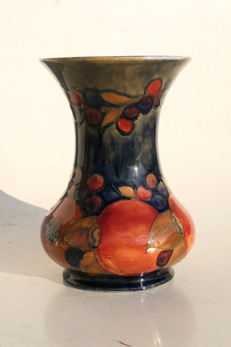 A Moorcroft Pottery vase decorated with fruit, 21cms (8.25ins) high.Condition Report Crazing to - Image 4 of 7