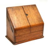 A Victorian oak desktop stationery box, 30cms (11.75ins) wide.