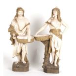 A pair of Austrian Ernst Wahliss Turn Pottery Eastern figures, the man holding a basket and a