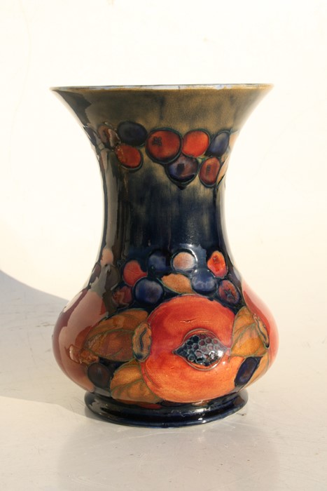 A Moorcroft Pottery vase decorated with fruit, 21cms (8.25ins) high.Condition Report Crazing to - Image 3 of 7