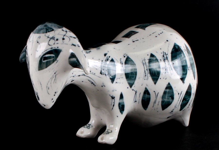 A Richard Parkinson pottery model of a sheep, designed by Susan Parkinson, model number 8, glazed in