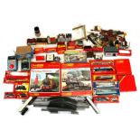 A large amount of 'OO' gauge Hornby locomotives, carriages, buildings and track; together with two