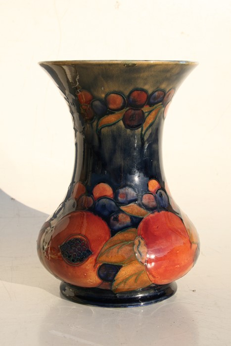 A Moorcroft Pottery vase decorated with fruit, 21cms (8.25ins) high.Condition Report Crazing to - Image 2 of 7