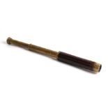 A Bernard Davis two-draw pocket telescope, 16cms (6.25ins) long when closed.