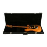 A Stratocaster copy Hondo II six-string electric guitar in a hard carry case.