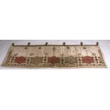 A Turkish silk and wire work embroidered wall hanging, 175cms (69ins) wide.