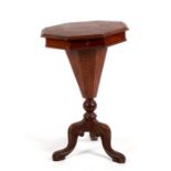 A Victorian walnut trumpet work table, 44cms (17.25ins) wide.