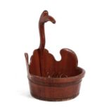 A Chinese wooden water bowl with duck head handle.