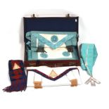 Masonic regalia aprons and sashes contained in a good quality brown leather case