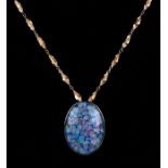 A 9ct gold set opal fragment pendant on a 9ct gold necklace.