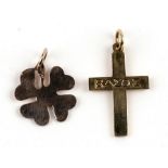 Two 14ct gold pendants, a crucifix and a lucky four leaf clover (2).
