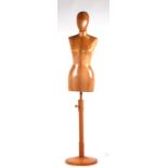 A solid wood shop display mannequin on stand.Condition Report Glued repair to inner wooden sleeve