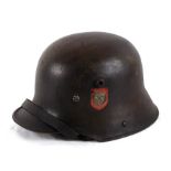 A Third Reich Waffen SS M16 helmet with double decals, liner and chin strap. Buyers are strictly