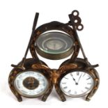 A Victorian desk top clock, barometer, thermometer, of hunting interest, in the form of three