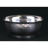 A Persian silver bowl with engraved decoration, 10cms (4ins) diameter.