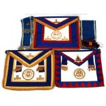 Masonic regalia aprons and sashes contained in a black case