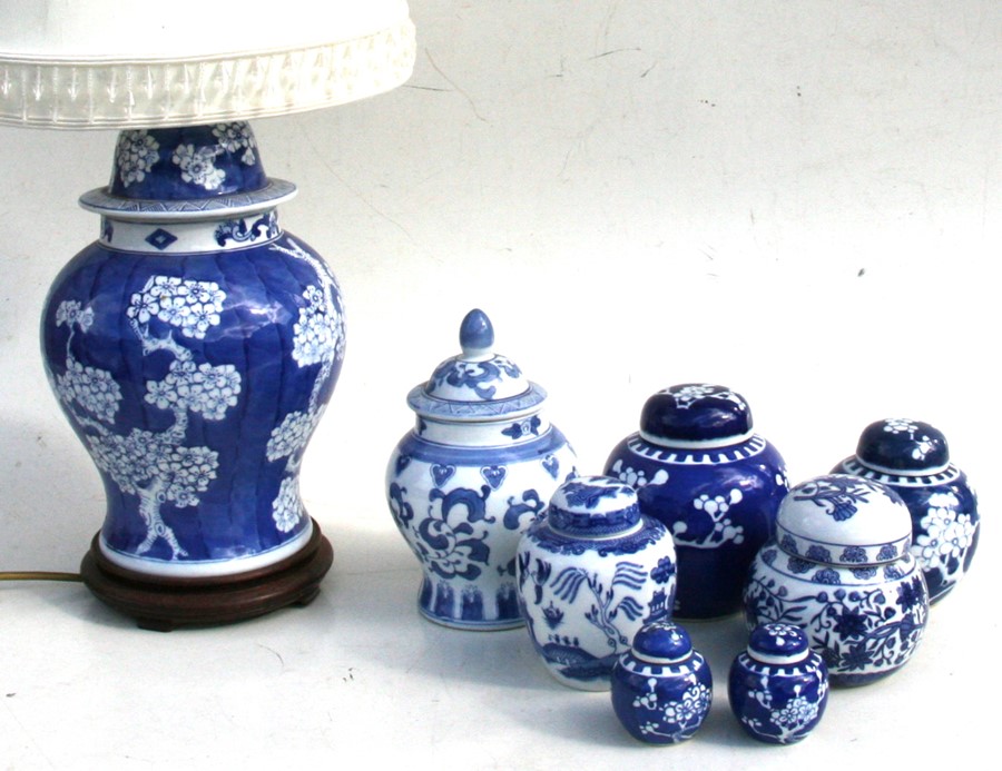 A quantity of modern Chinese blue & white ceramics to include ginger jars and a table lamp.