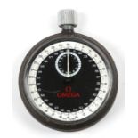 An Omega stopwatch with matt black dial, 5cms (2ins) diameter.