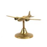 A WW2 brass two engined Bomber Aircraft standing on its brass base. Wingspan 17cms (6.75ins)