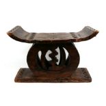 African / Tribal Art. An Ashanti stool, 56cms (22ins) wide.