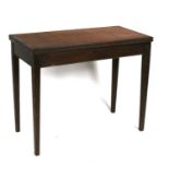 A mahogany card table on square tapering legs, 92cms (36ins) wide.