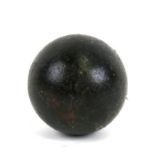 An 18th/19th century cast iron 3lb (approximately) round shot cannon ball. Approximate diameter 7cms