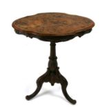 A 19th century continental occasional table, the top with inlay and penwork decoration, on turned