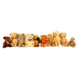 A group of plush jointed teddy bears and other bears, the largest 15cms (6ins) high.