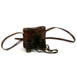 A pair of WWI Officer's binoculars in a leather case, stamped '277A'.