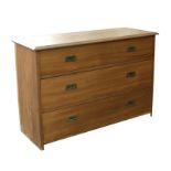 A stripped satin walnut chest of three long graduated drawers, 126cms (49.5ins) wide.