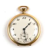 A Slimline open faced gold plated pocket watch with Arabic numerals and subsidiary seconds.