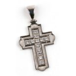 A 14ct white gold crucifix pendant.